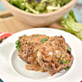 Feta stuffed burger with tomato cream sauce